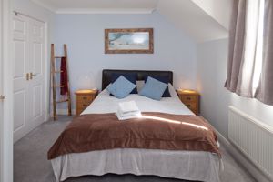 Bedroom One- click for photo gallery